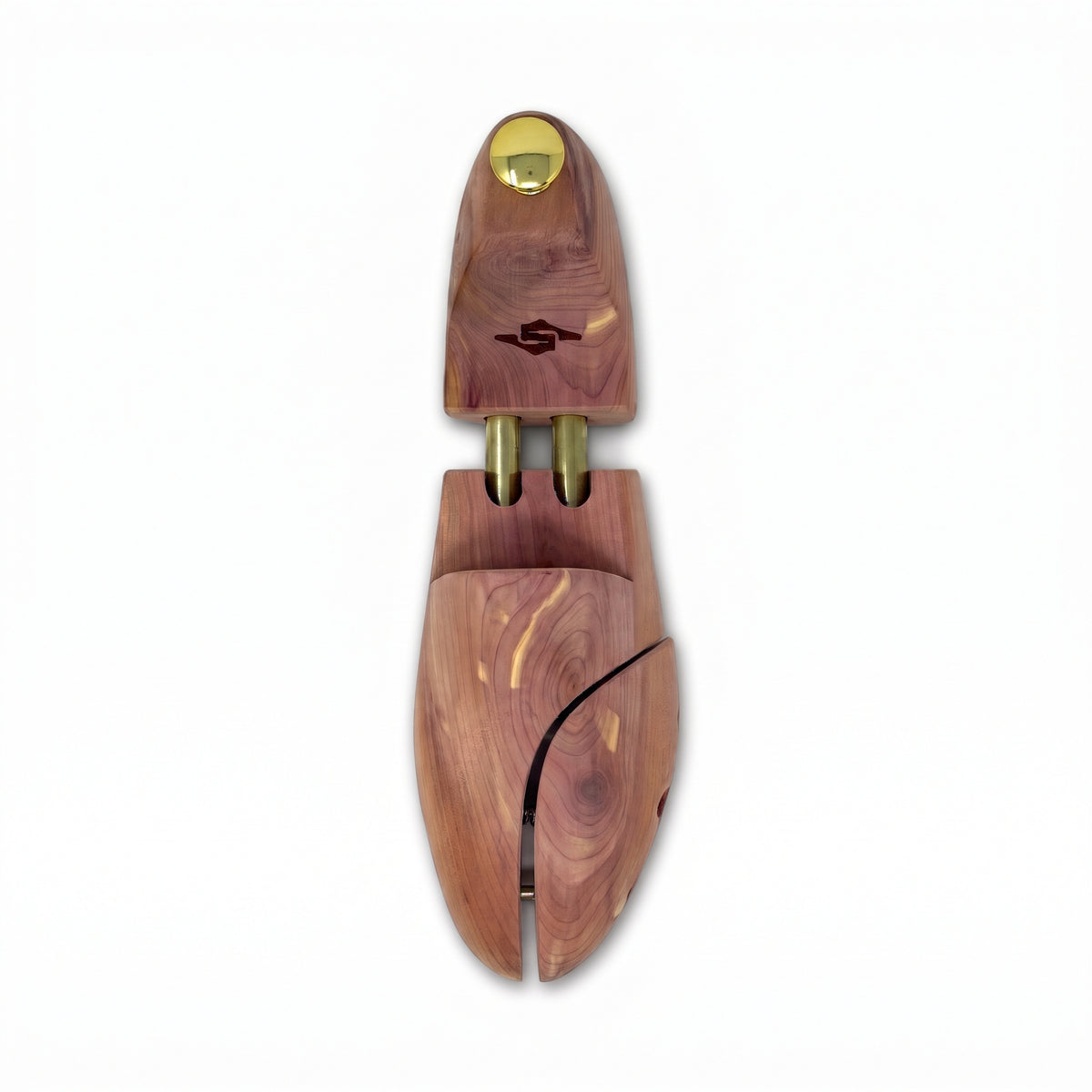 Top-down view of premium cedar shoe tree showing natural wood grain and split-toe shaper